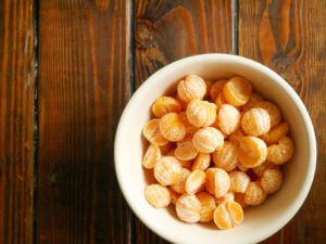 peeled mandarin oranges in a bowl