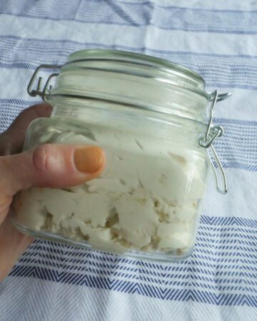 homemade whipped shea butter lotion in glass jar