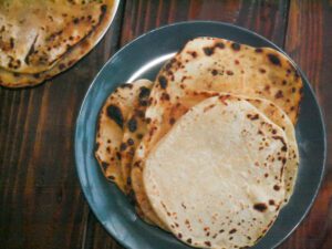 homemade sourdough discard tortillas on two plates