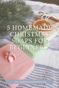 4 homemade Christmas soaps in a diagonal row with Christmas tree branch in background