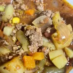 hamburger soup in a white bowl