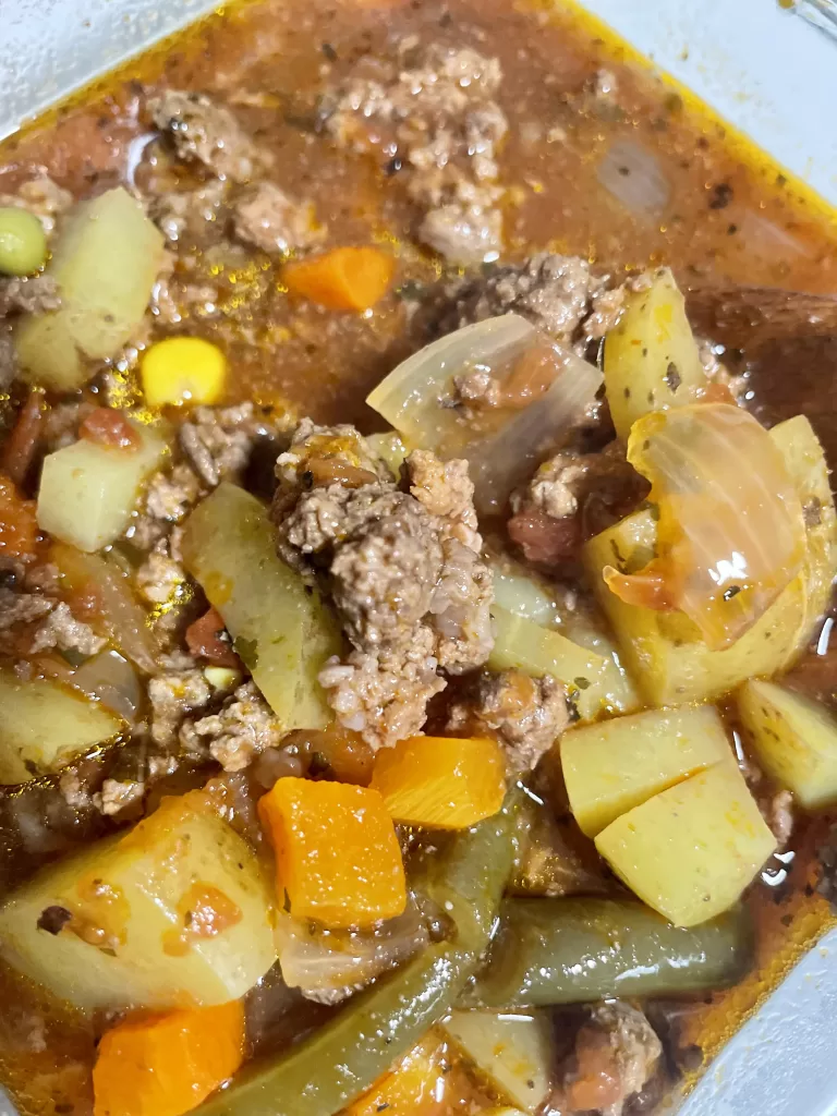 hamburger soup in a white bowl