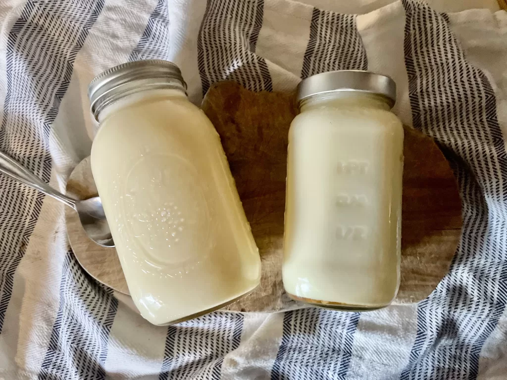two glass jars of beef tallow