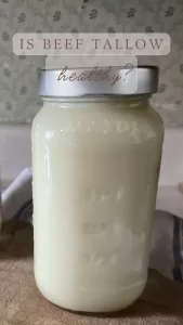 solidified beef tallow in a glass jar