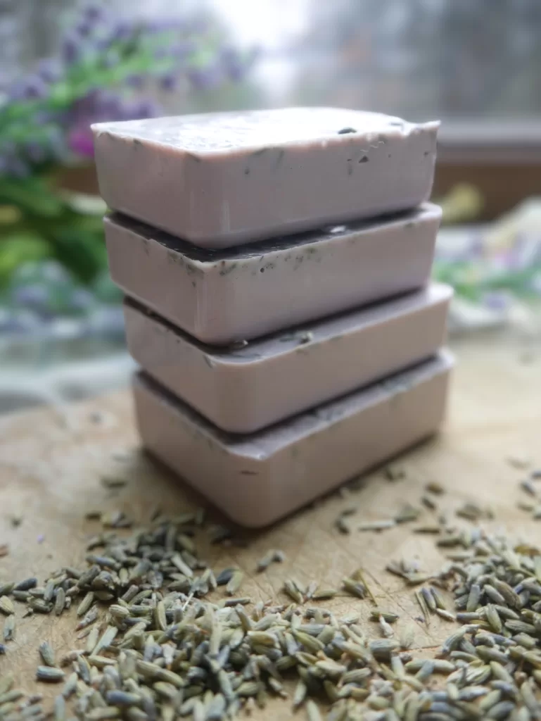 4 bars of purple, lavender soap stacked on one another