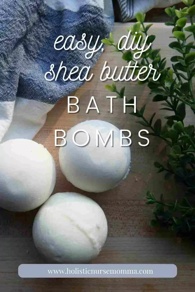 words "easy diy shea butter bath bombs" in front of bath bombs on wooden board