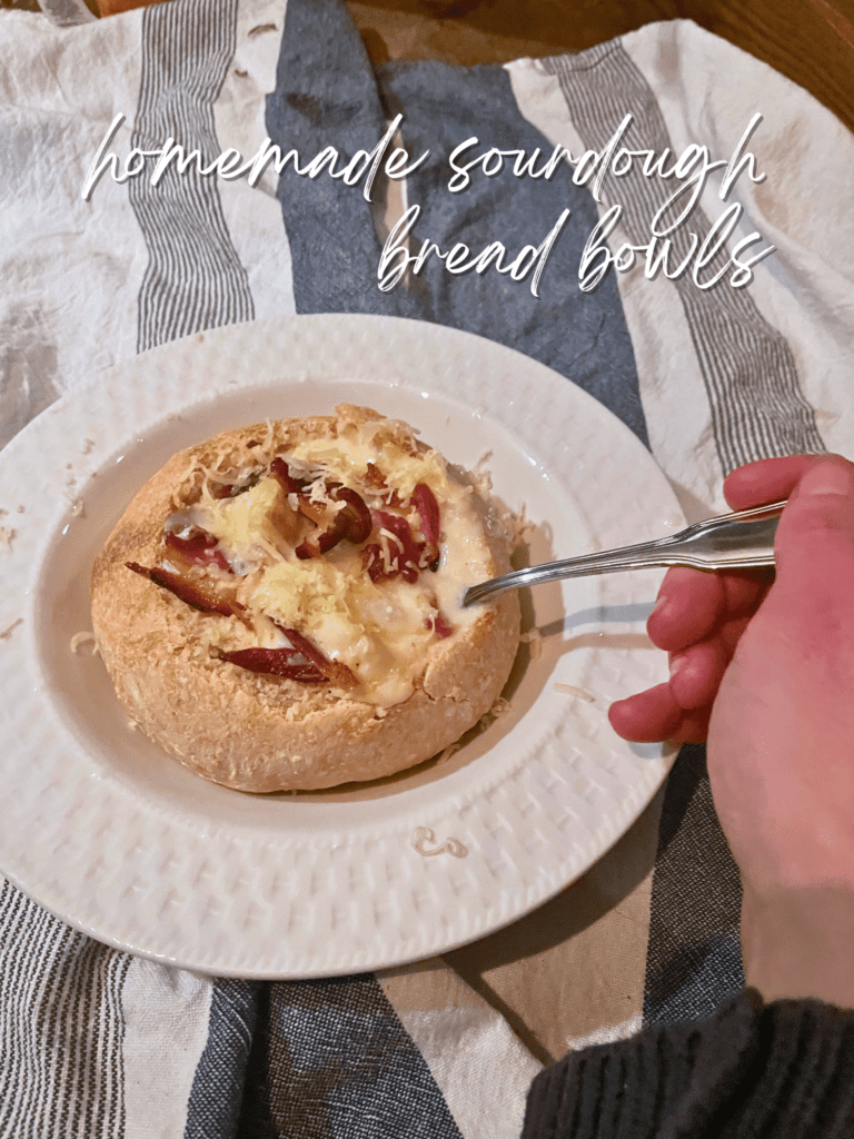 homemade sourdough bread bowl with loaded potato soup inside