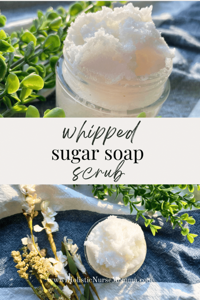 whipped sugar soap scrub in a glass jar next to flowers and leaves 