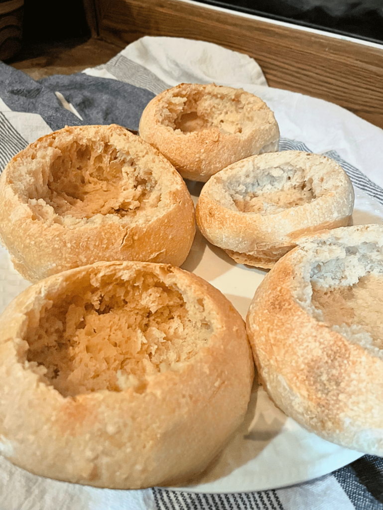 sourdough bread bowls with the middle pulled out