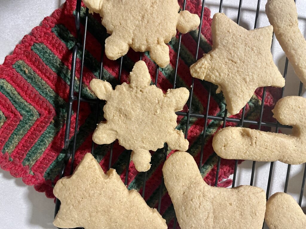 uniced fresh milled flour sugar cookies sitting on a cooling raack