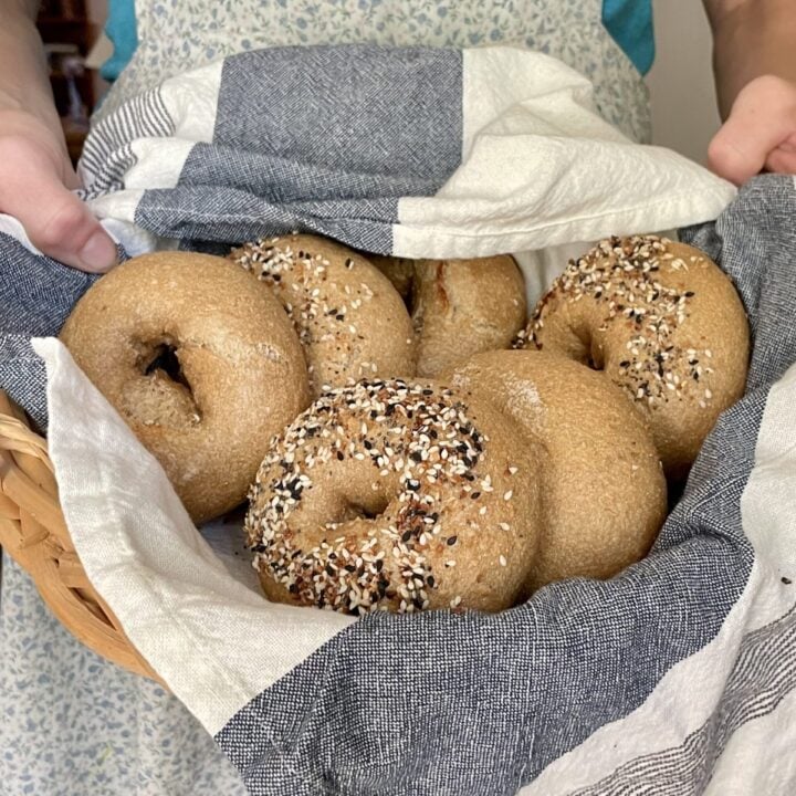 sourdough bagels made with fresh milled flour in basket being held