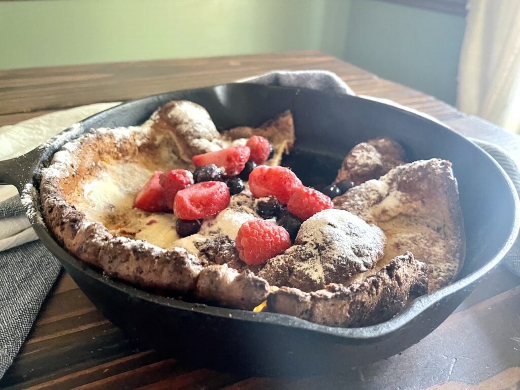 fresh milled flour dutch baby pancake in cast iron skillet