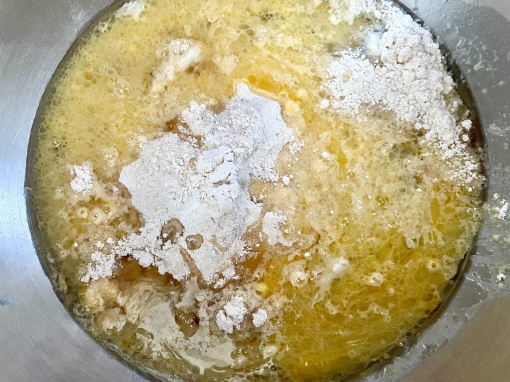 wet and dry ingredients to buttermilk carrot cake with fresh milled flour